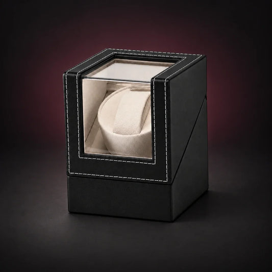 Solo single-watch winder with a black exterior and one cream cushion; digitally styled supplier photograph.