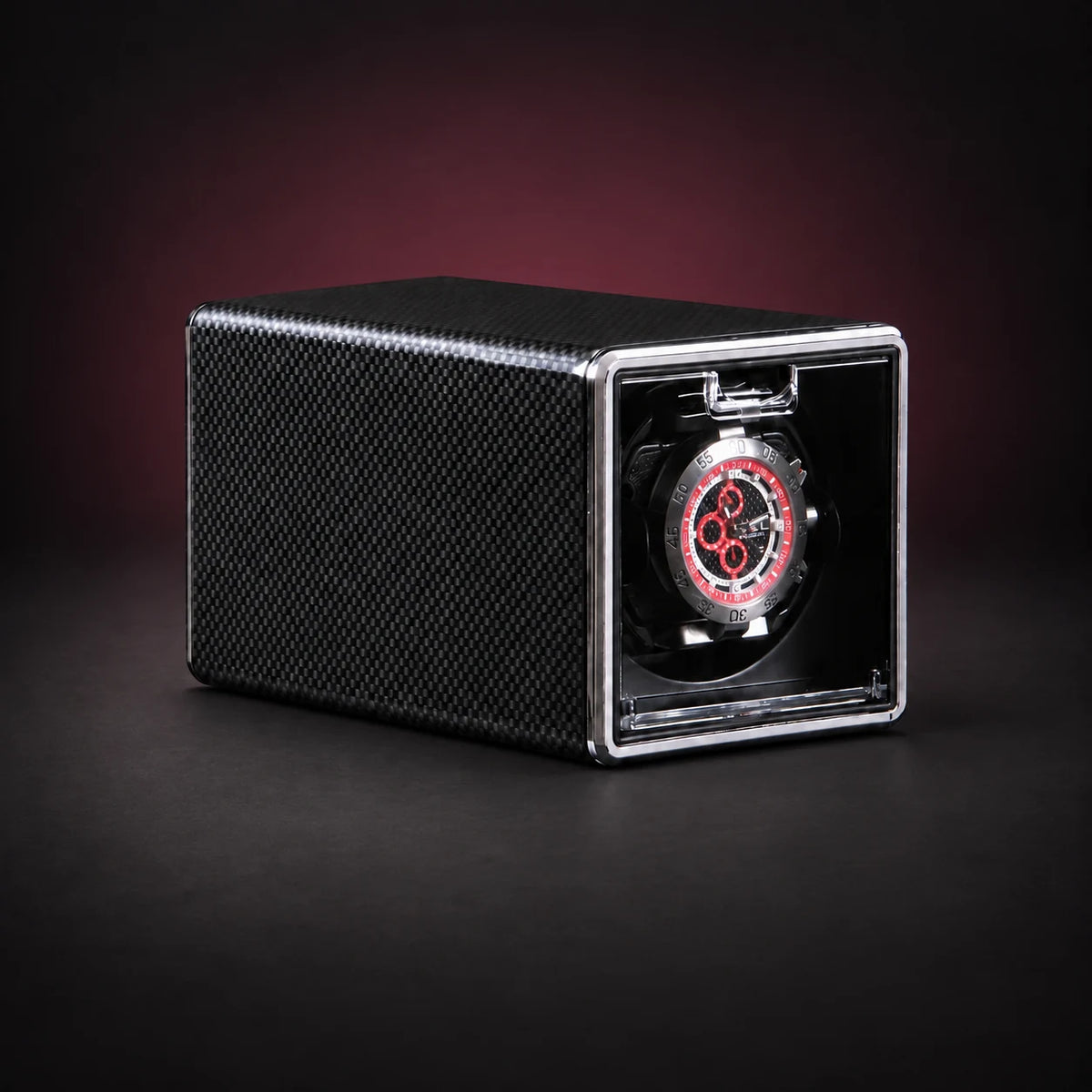 Cube black carbon-look single watch winder with a clear front window and a demonstration watch, not included.