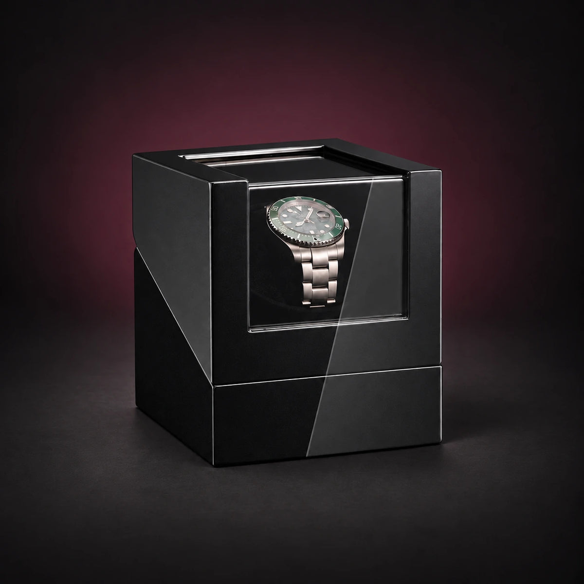 Studio black single watch winder with a closed clear lid and dark interior; demonstration watch not included.