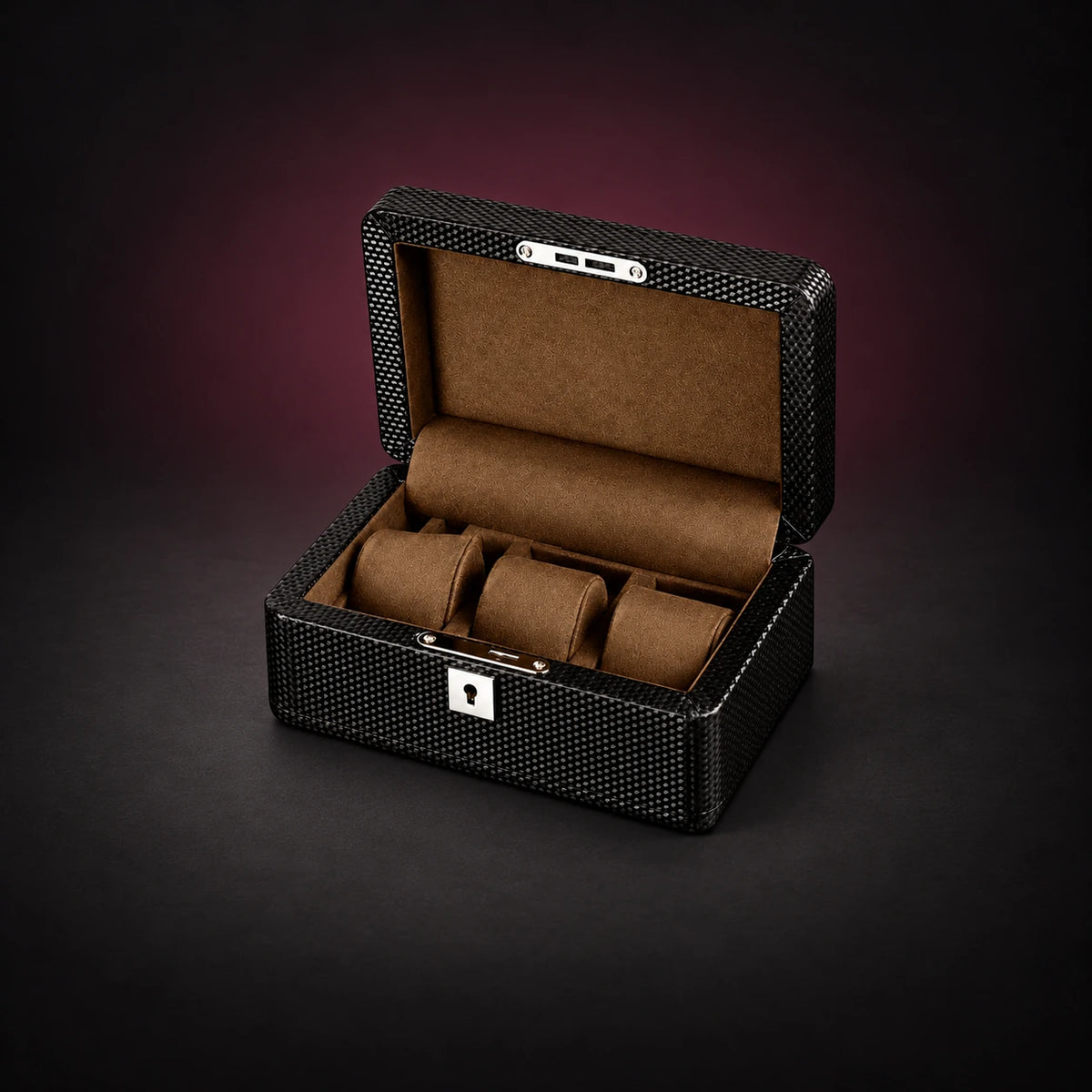Gallery three-watch storage box in a black carbon-look finish, open to a brown interior with three cushions.