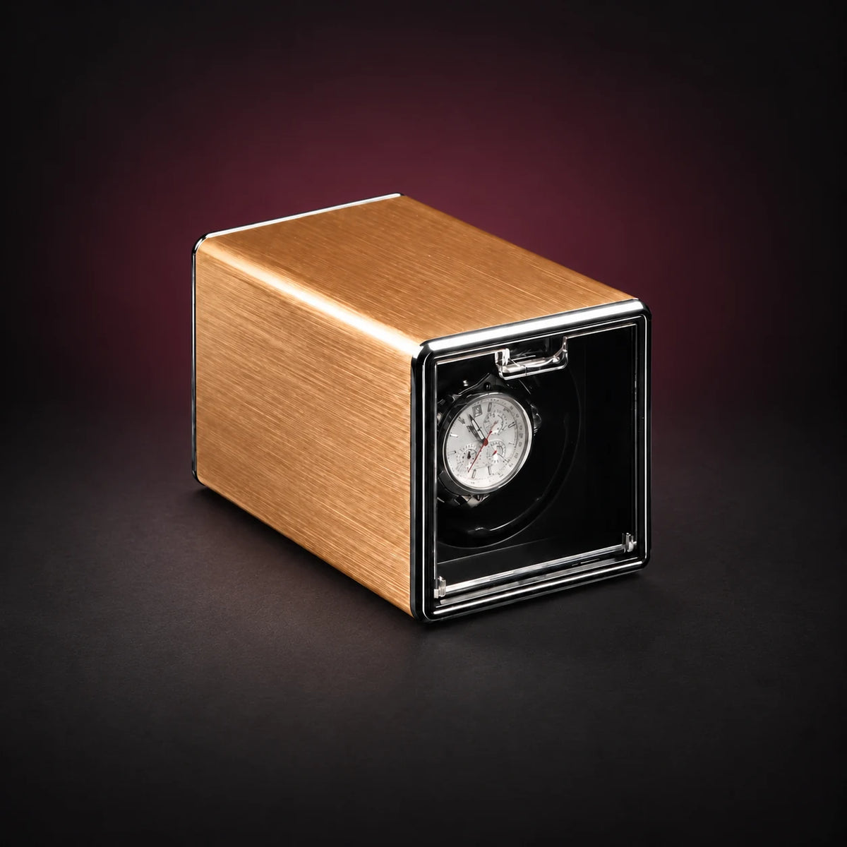 Cube gold-tone single watch winder with a clear front window; demonstration watch not included.