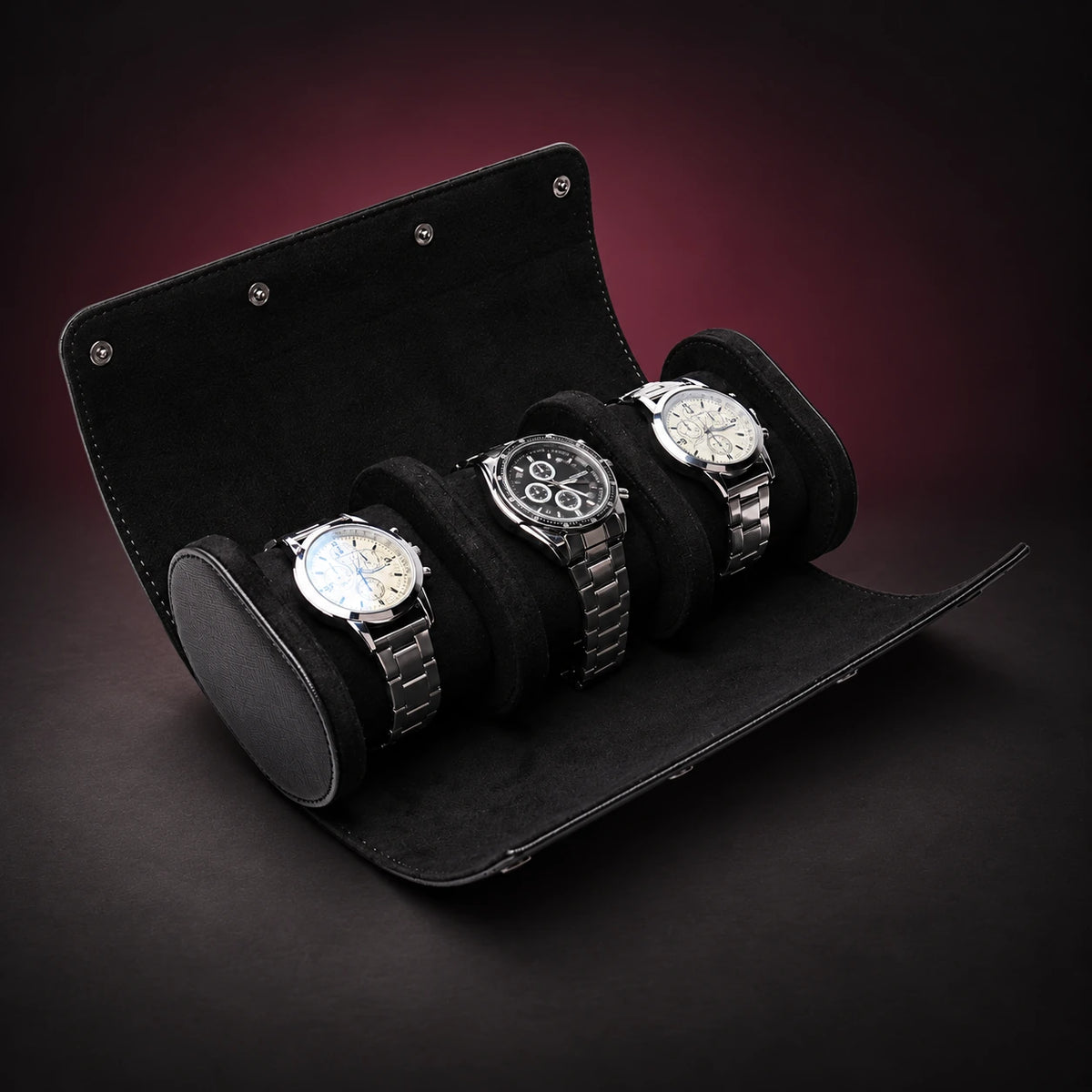 Nomad black PU three-watch travel roll shown open; demonstration watches are not included.