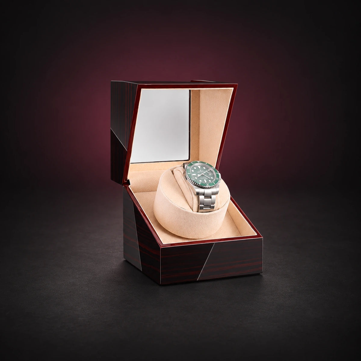 Studio single watch winder in an Ebony wood-look finish with its lid open; demonstration watch not included.