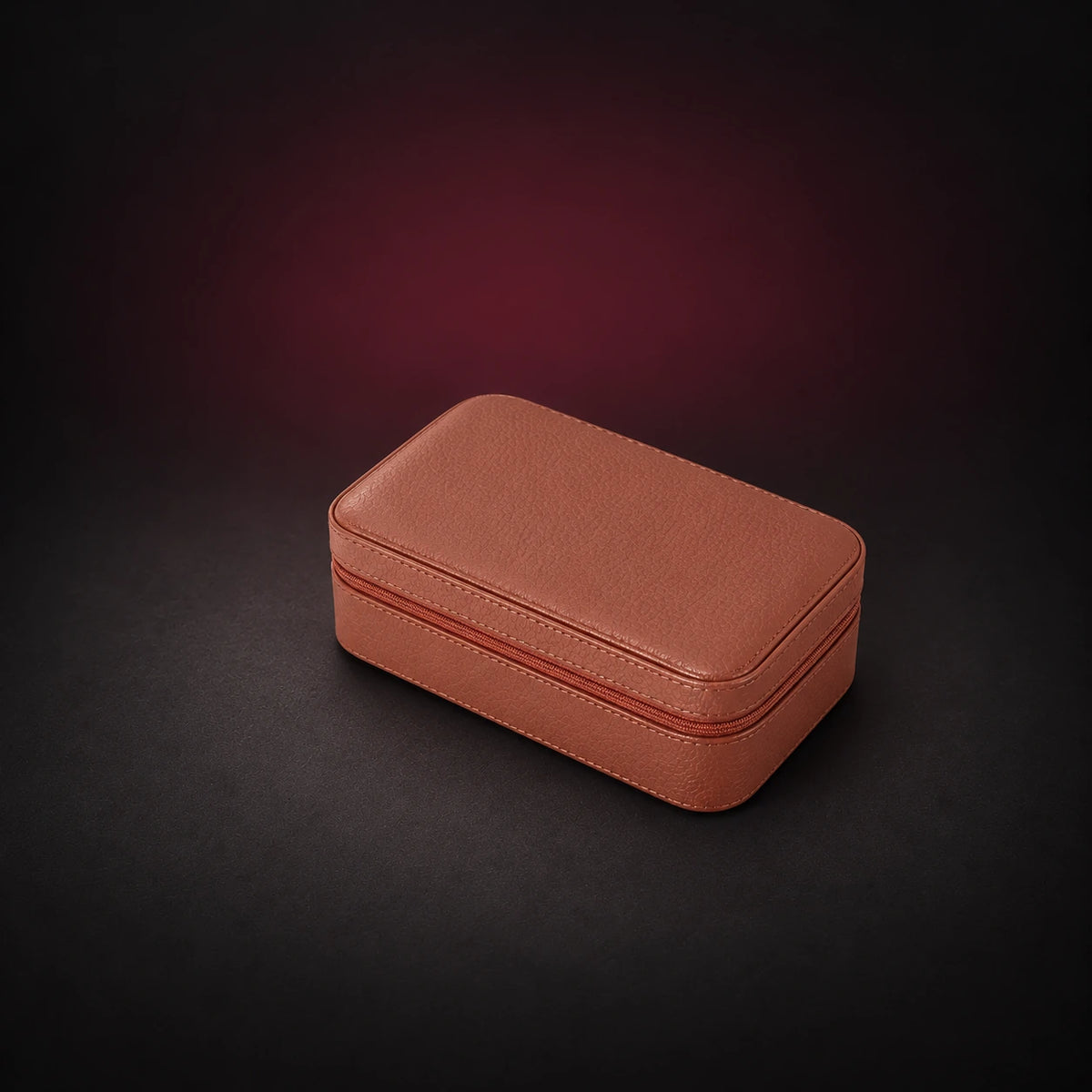 Voyage brown pebbled three-watch travel case shown closed with its zippered edge visible.