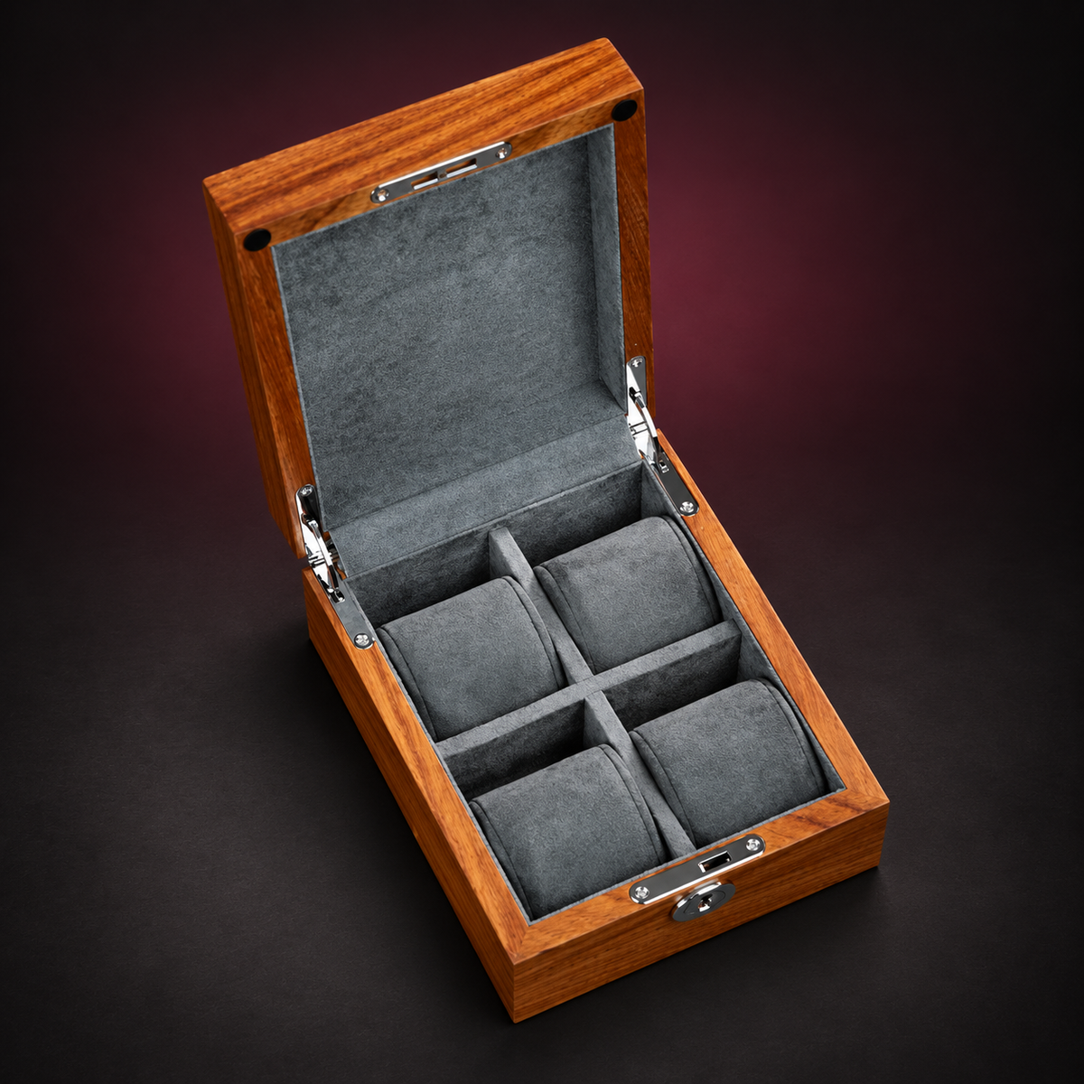 Warm brown four-watch storage box with its solid lid open, grey lining, four empty cushions and silver-colored lock and hinges; digitally styled background.