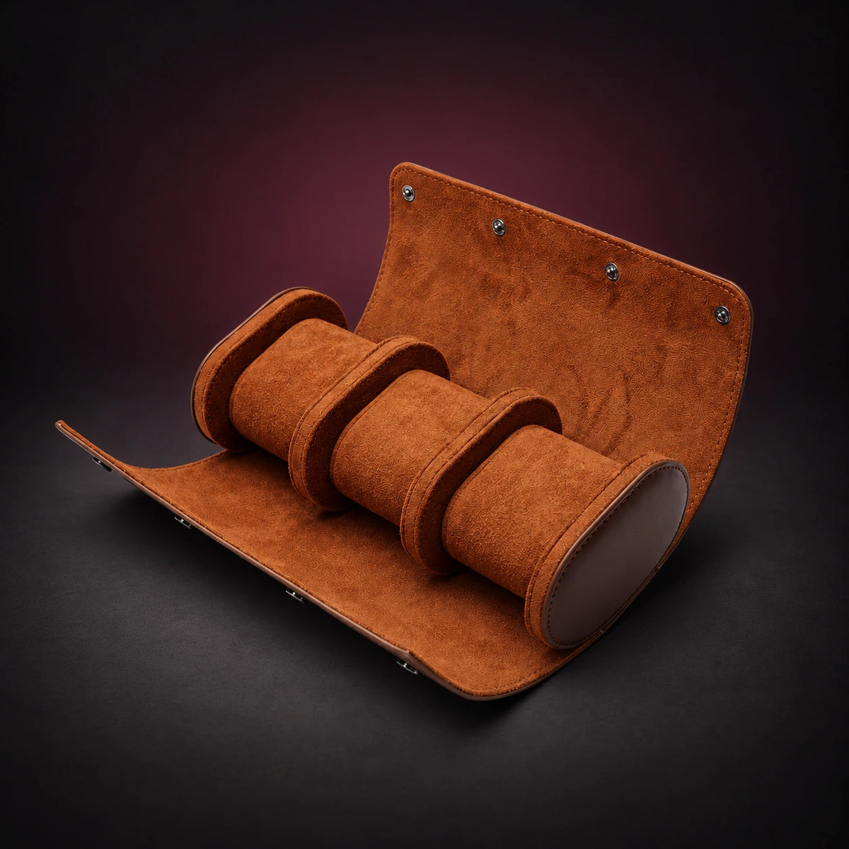 Nomad brown PU three-watch travel roll shown open with three individual cushions.