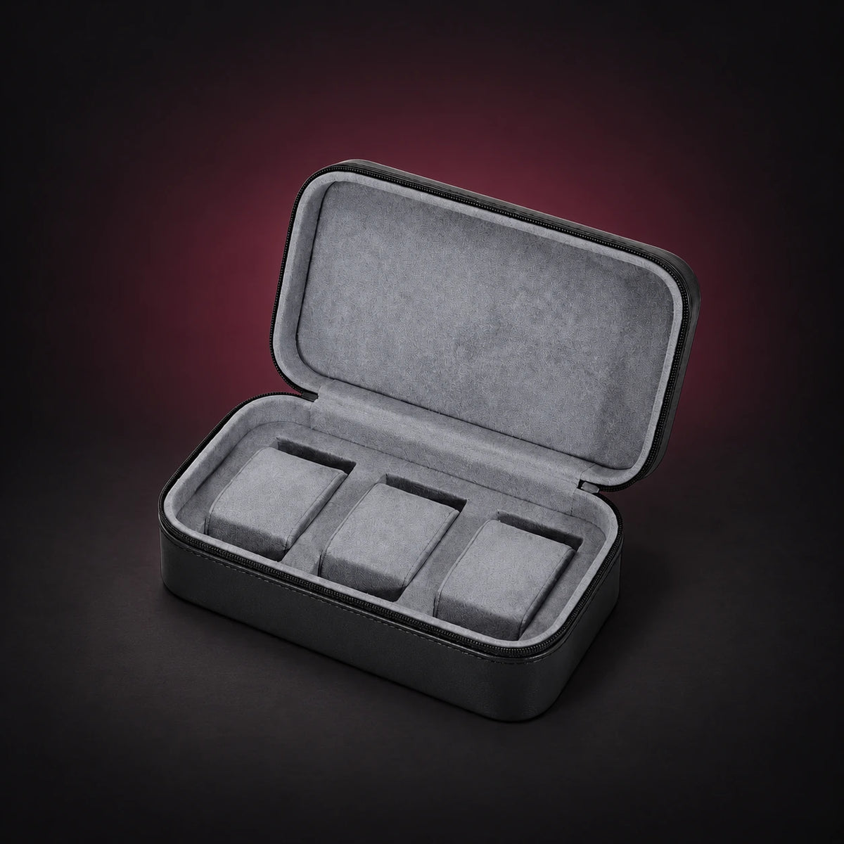 Voyage black three-watch travel case shown open with three separate padded spaces.