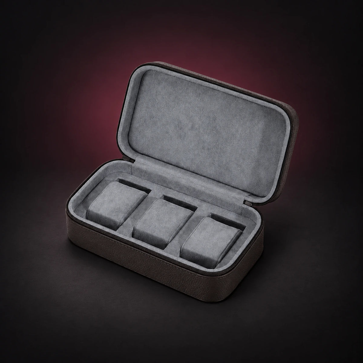 Voyage coffee pebbled three-watch travel case shown open with three separate padded spaces.
